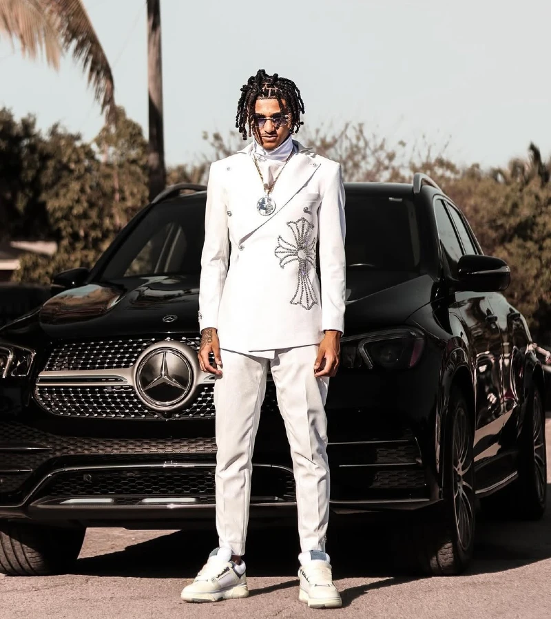 The Bold White Cross-Adorned Suit